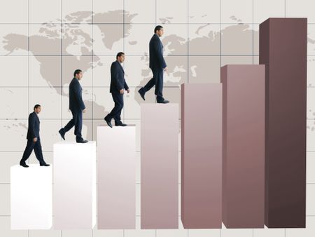 business men gowing up the columns on a graph, representing growth
