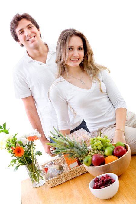 Couple with a table full of healthy eating food
