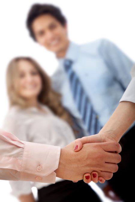 Business handshake in a corporate environment isolated
