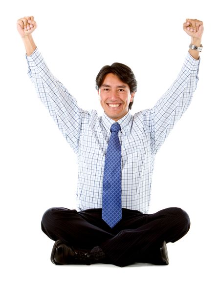 sucessful business man sitting on the floor isolated over a white background