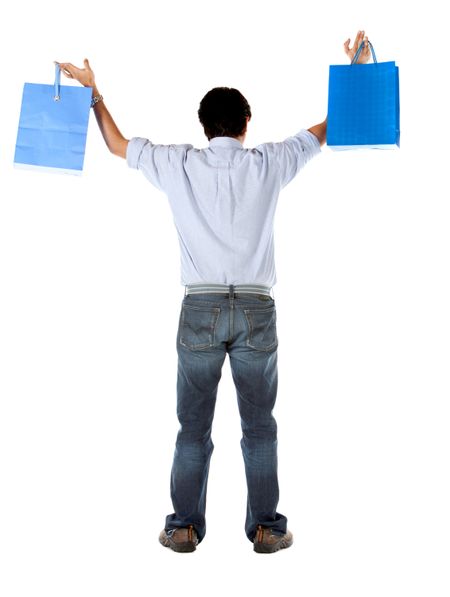 Man with shopping bags isolated over a white background