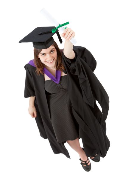 top view of a female graduate smiling and showing her diploma