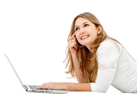 Casual girl on a laptop coming up with an idea over a white background