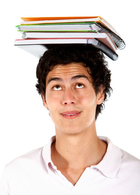 male student with notebooks on top of his head isolated over a white background
