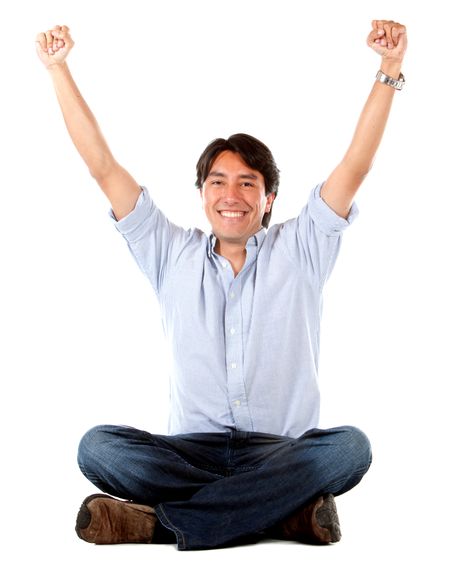 Successful man with arms up and smiling isolated over a white background