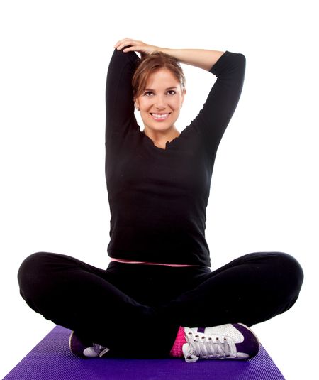 Woman doing stretching exercises - isolated over a white background