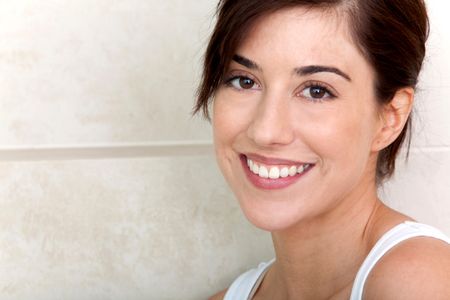 beauty portrait of a woman smiling and looking happy