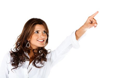 Business woman pointing at something isolated over a white background