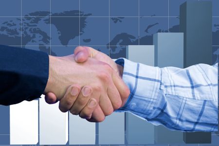 business deal over a business chart in blue
