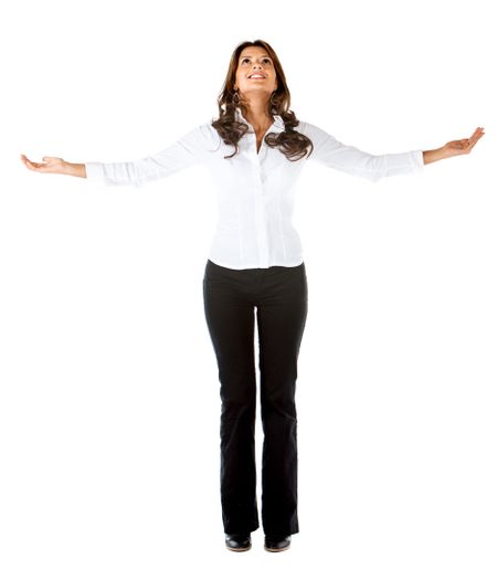 Successful business woman with arms opened isolated over a white background