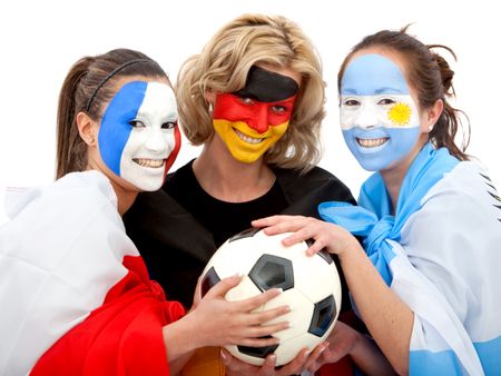 Group of football fans holding a soccer ball with their faces painted - Isolated over a white background