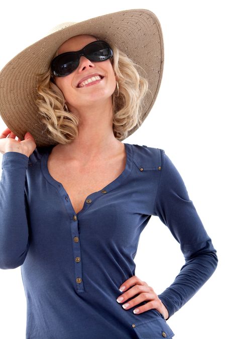 Fashion woman wearing hat and sunglasses isolated over a white background