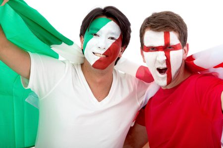 Couple of football fans looking happy with their faces painted - Isolated over white