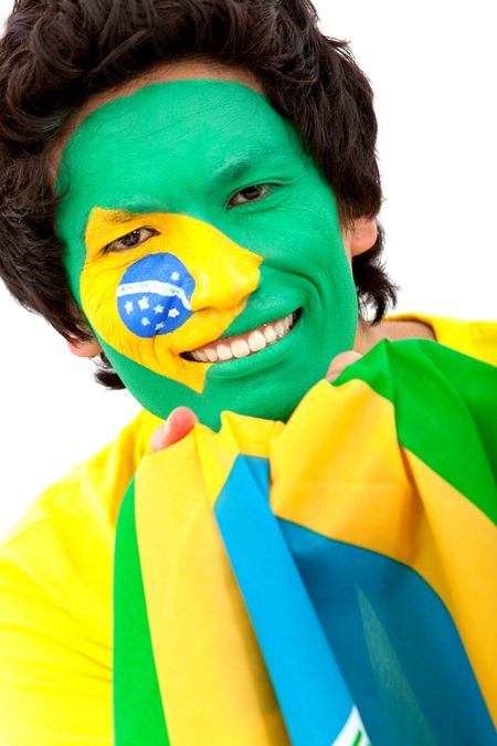 Portrait of a man with the brazilian flag painted on his face - isolated