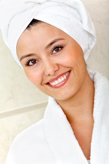 Beauty female portrait with a towel on her head