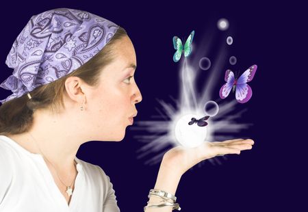 Beautiful girl blowing butterflies - future reader