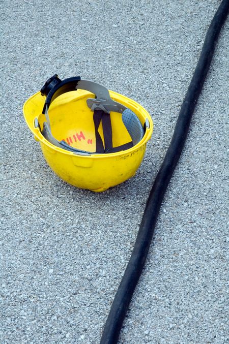 Hardhat by cable on the ground