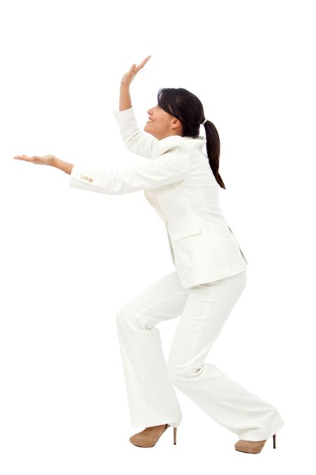 Business woman holding something imaginary isolated over a white background