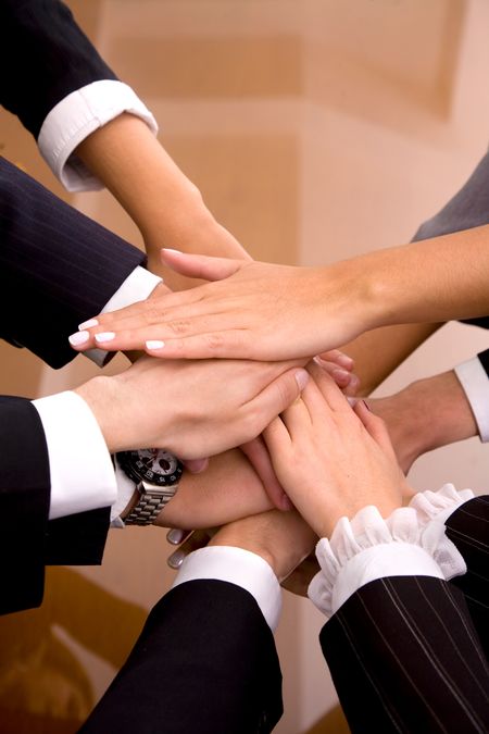 business office team work - hands of successful businessmen and businesswomen