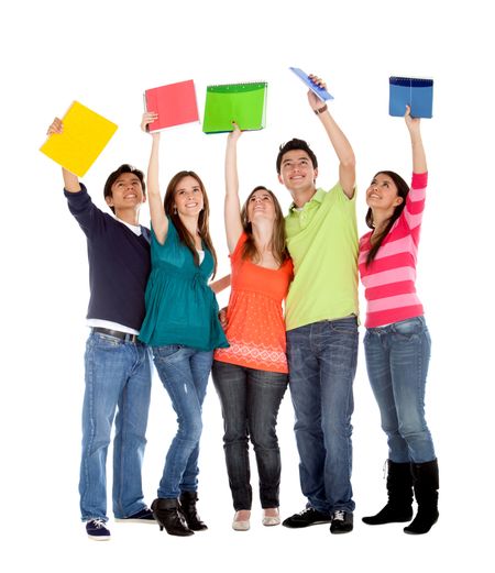 Happy group of students with notebooks - isolated over a white background