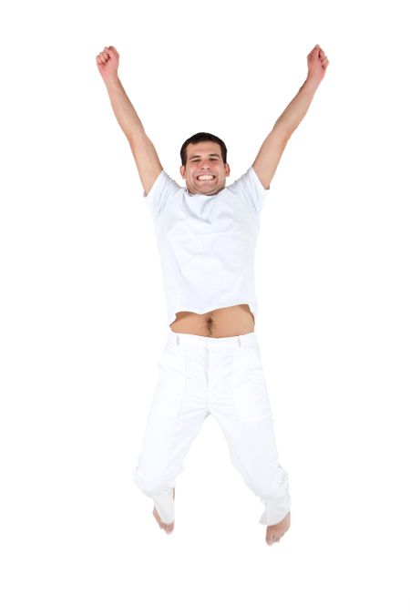 Excited man jumping and wearing white clothes - isolated