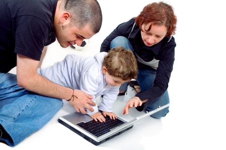 family on a laptop computer isolated over a white background
