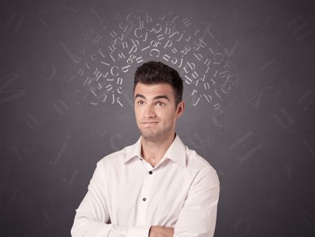 Young casual businessman with white alphabet around his head