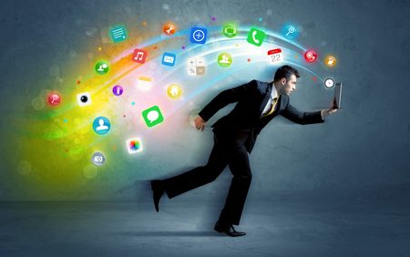 Running businessman with colorful application icons from media device