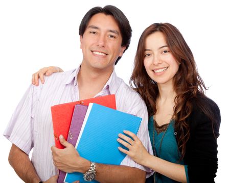 Couple of students with notebooks - isolated over a white background