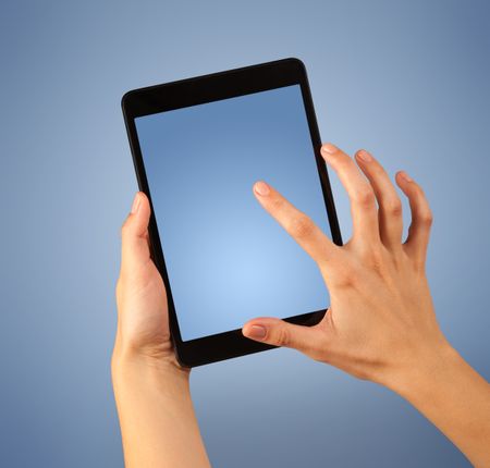Female fingers touching blank tablet 