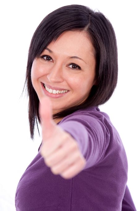 Happy woman with thumbs up - isolated on white
