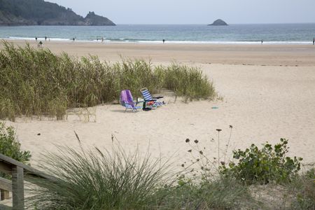 Deckchairs at Abrela Beach, Galicia, Spain