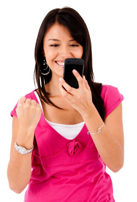 Happy woman text messaging on her mobile ? isolated over white