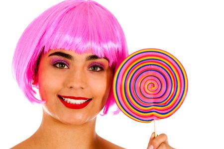 Girl with a pink wig eating a lollipop - isolated over white