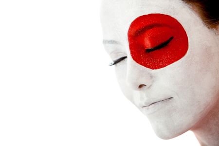 Japanese woman with the flag painted on her face - isolated