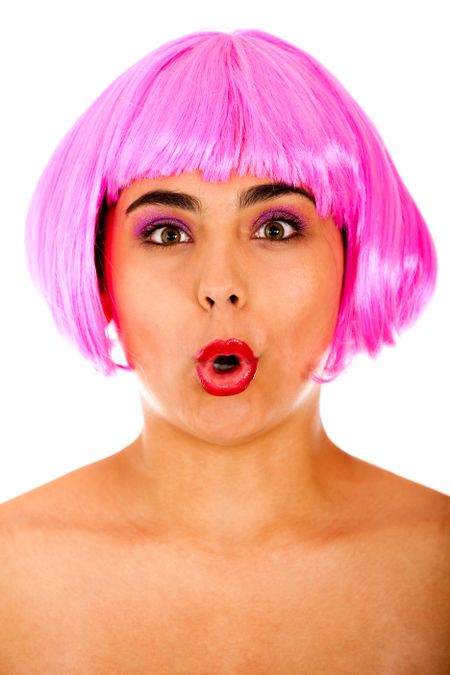 Eccentric woman portrait making faces with a pink wig - isolated