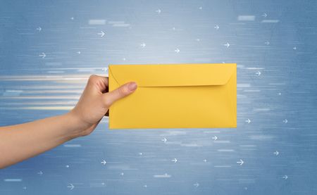 Female hand holding empty and full envelope with blue background and direction concept
