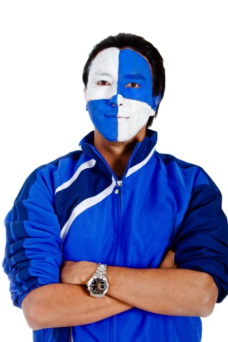 Man with a blue and white flag painted on his face