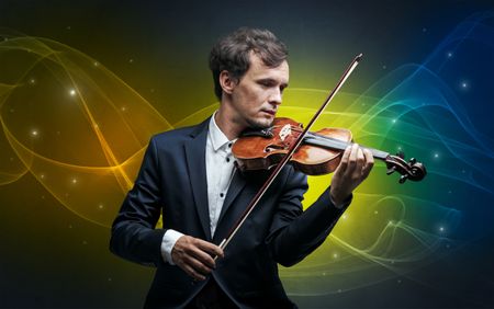 Serious classical violinist with fabled sparkling wallpaper