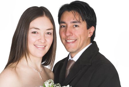 bride and groom smiling over a white background