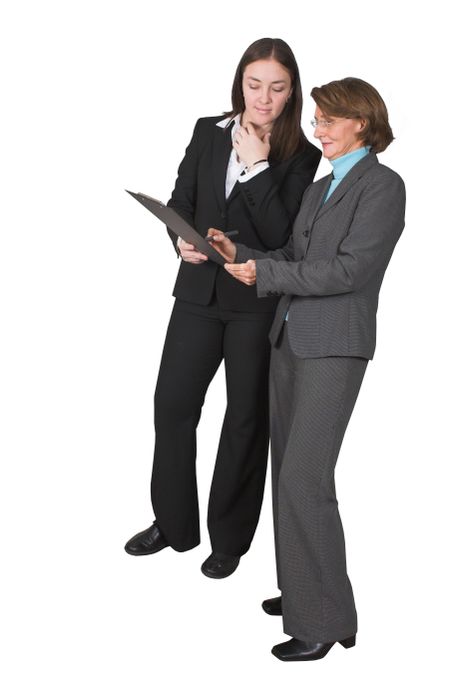business women looking at folder