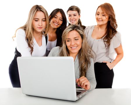 Successful business women going online on a laptop - isolated