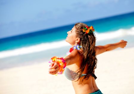 Hawaiian woman enjoying her holidays at the beach