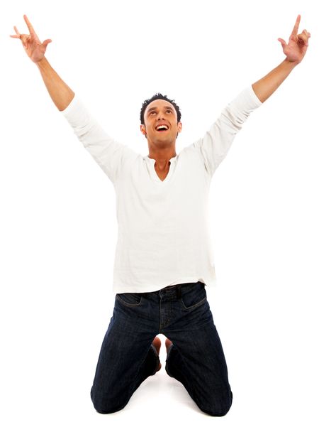 casual happy man celebrating his success isolated over a white background