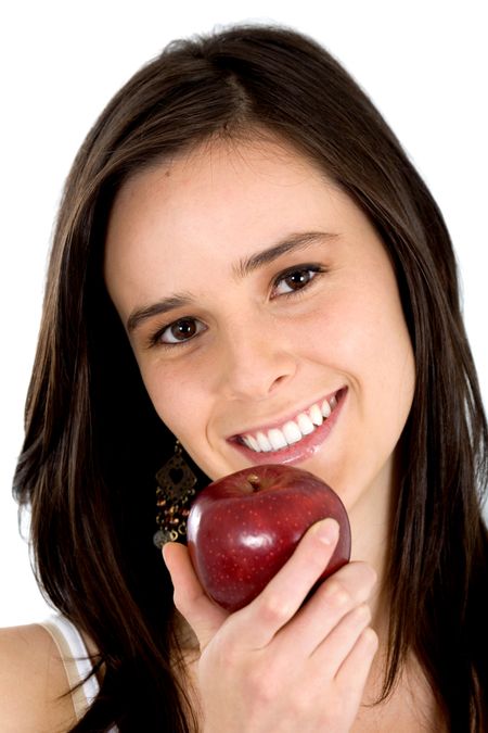 casual woman with an apple isolated over a white background