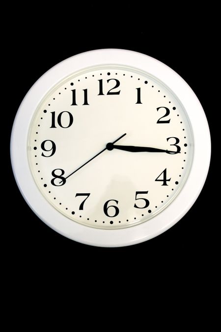 clock over a black background