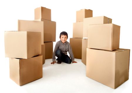 Boy with cardboard boxes - isolated over a white background