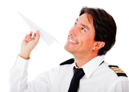 Handsome pilot with a paper airplane - isolated over a white background