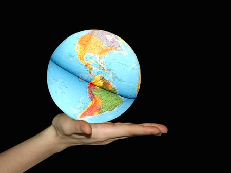 Hand holding Earth Globe