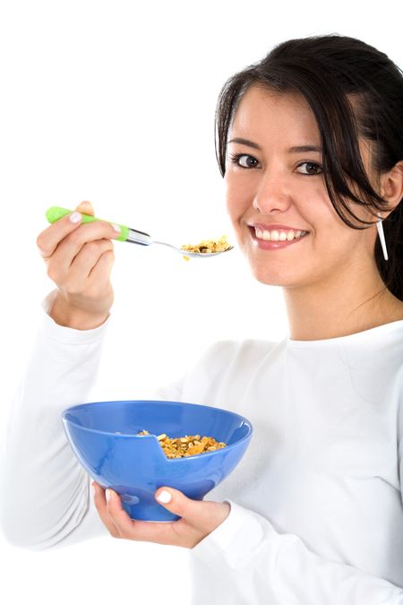 girl eating cereal isolated over a white background